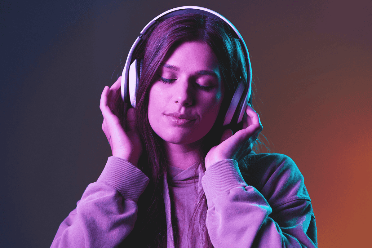 Woman listening to headphones